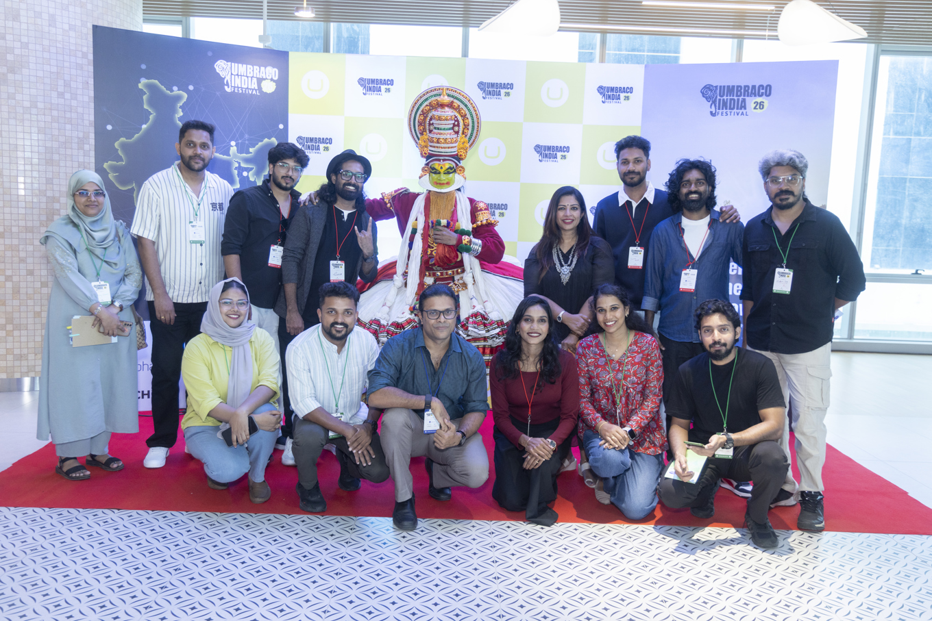 Group photo of the festival organizers with a Kathakali Performer