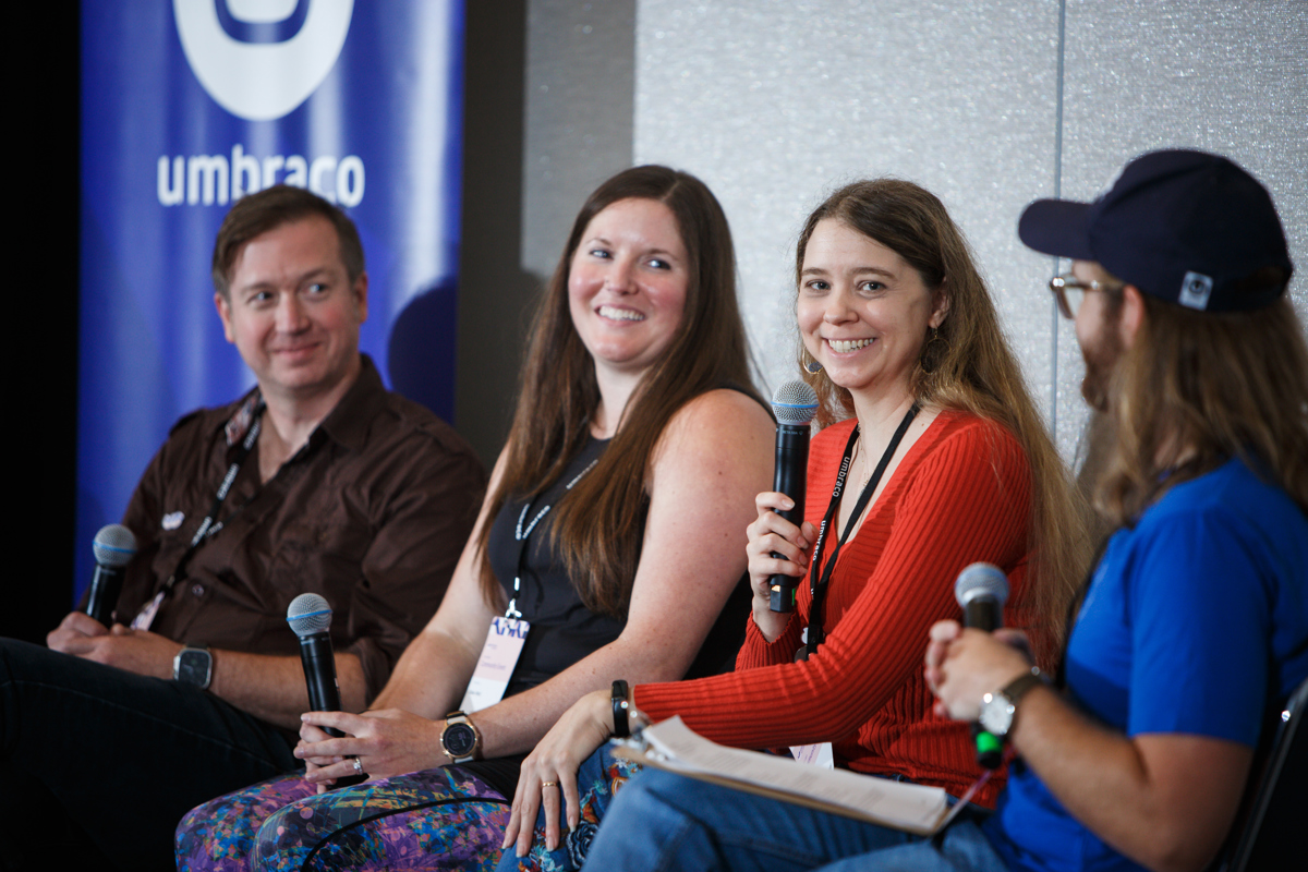 Panel speaking in mics at umbraco event